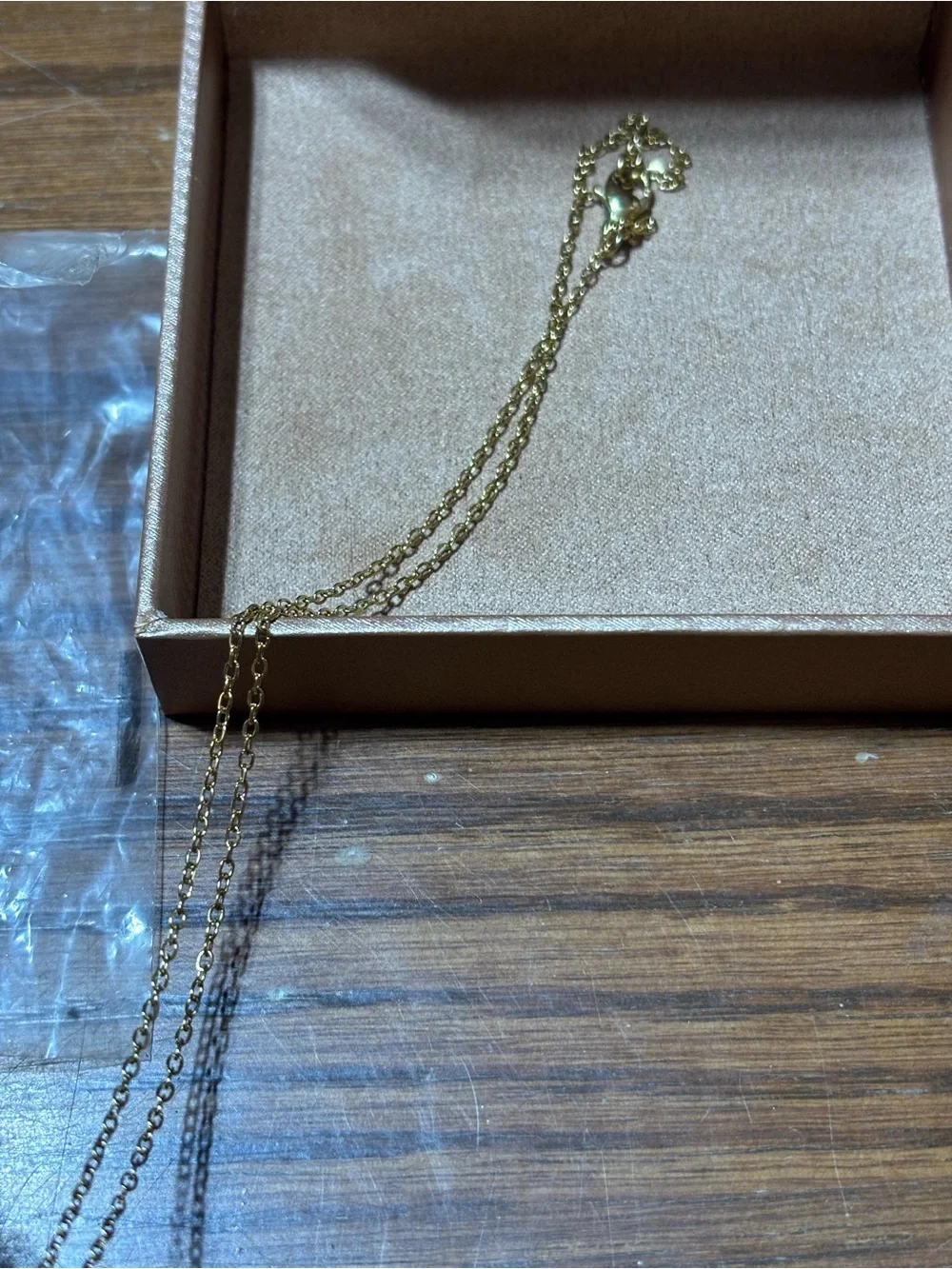Gold tone initial K pendant necklace